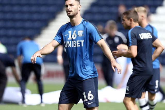 Andrew Hughes warms-up ahead of PNE's clash with QPR