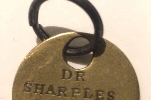 Dog tag belonging to Dr Sharples favourite pet dog