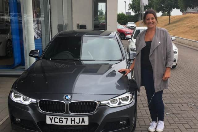 Lyndsey McDaid, who is a regional manager at Body Shop at Home with her new BMW.