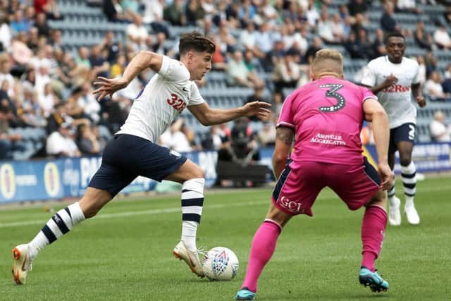 Josh Harrop looks to find an opening in PNE's opening day win over QPR