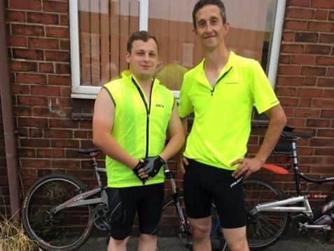 Lostock Hall Memorial Bands musical director Josh Hughes (left) and bass player Glen Tomlinson cycled 189 miles from their band room to Cheltenham Race Course