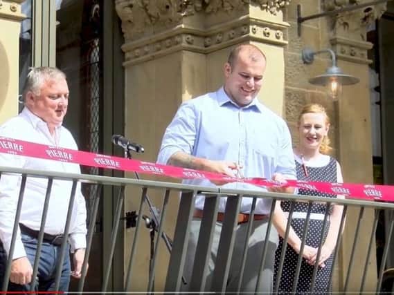 Greg Dunnings cuts the ribbon at Bistrot Pierre