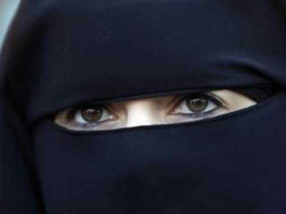Bus driver disciplined after Muslim mum asked to remove veil