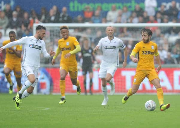 Ben Pearson in the thick of the action at Swansea