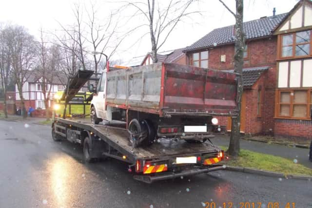 Two men have been slapped with fines after fly-tipping waste on an isolated track in Preston.