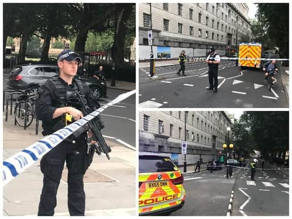 Police activity on Millbank, in central London, after a car crashed into security barriers outside the Houses of Parliament.