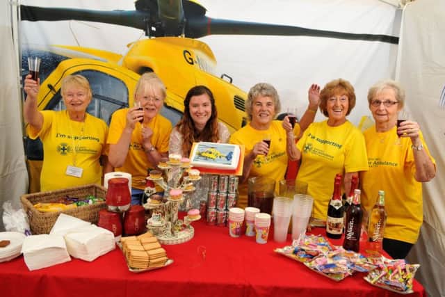 The opening of the NW Air Ambulance Shop, Garstang
Val Sutcliffe, Rosemary Moss, Rebecca Haynes, Edie Southwell, Wendy Sutcliffe, and Enid Parsonage
