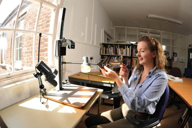 Lydia Prosser at work examining a recent find