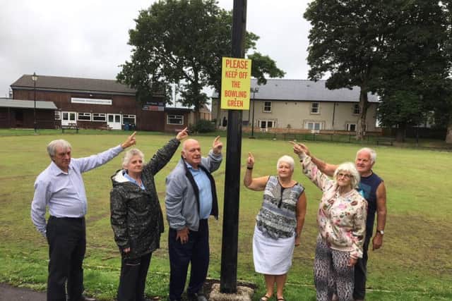 Longridge residents point out the sign they say youngsters ignore