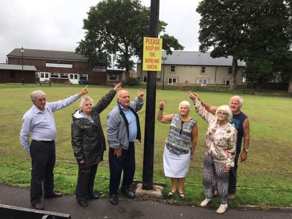 Longridge residents point out the sign they say youngsters ignore