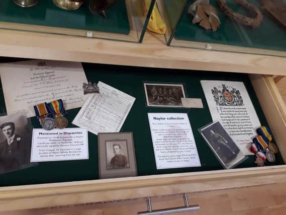 Medal drawer in Chorley 100 in tribute to the Naylor family. James Naylors five sons served during World War One