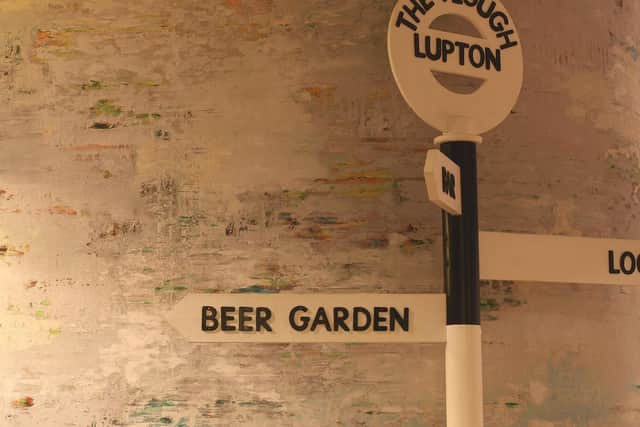 Quirky signage in The Plough's entrance