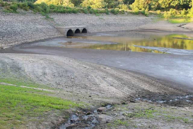 The dried up bed of the United Utilities owned Wayoh Reservoir in the village of Edgworth, Bolton