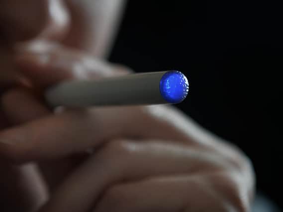 Vaping is less harmful than conventional smoking and the two should not be treated as the same, according to a report by the Science and Technology Committee. See PA story HEALTH ECigarettes. (Photo: Anthony Devlin/PA Wire)