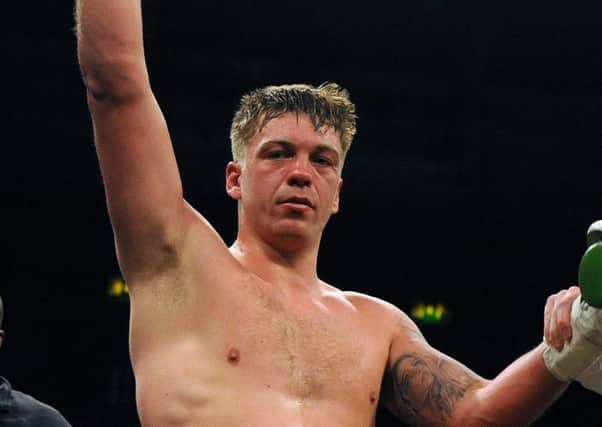Matty Clarkson salutes the Preston Guild Hall crowd after winning what turned out to be his final fight in March