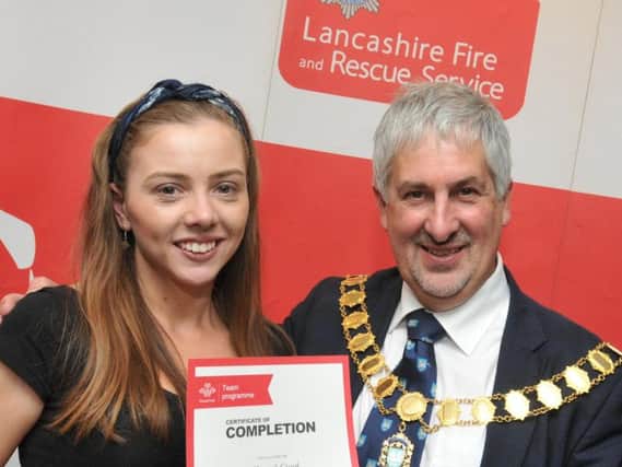 The Mayor of Preston Coun Trevor Hart, right, presents Hannah Crook with her certificate.