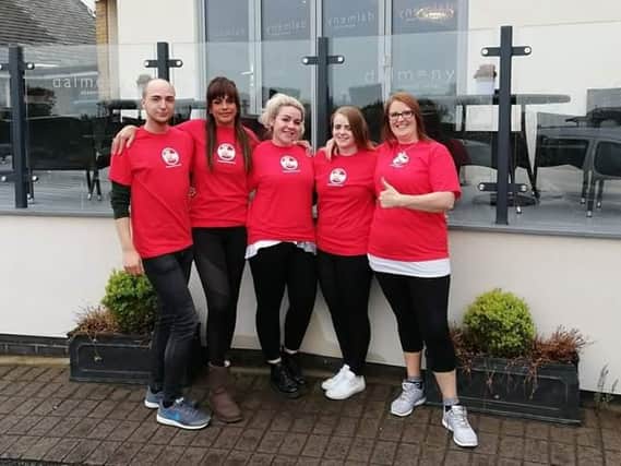 Kath Hands (far right) with colleagues from Dalmeny Hotel, in Lytham, who have been raising funds for UK Sepsis Trust
