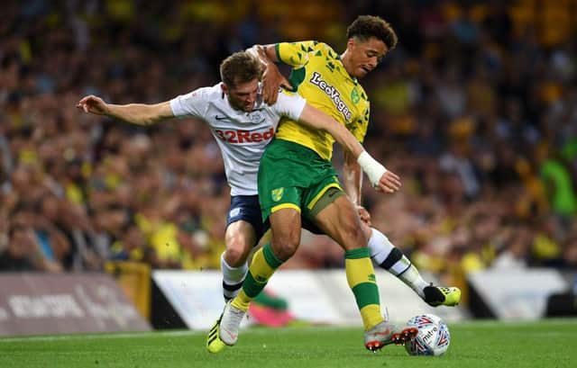 Preston North End's Tom Barkhuizen in action against Norwich