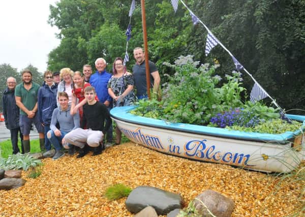 Volunteers with their Penwortham in Bloom floral boat display