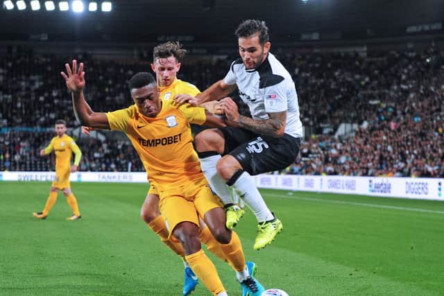 Darnell Fisher and Alan Browne in action during last season's game at Pride Park