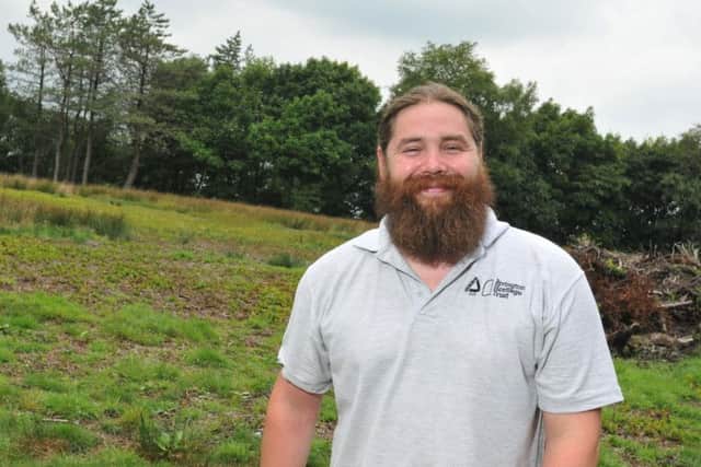 Liam Roche, senior development officer at Groundwork at Rivington Terraced Gardens, is preparing for the Big Thank You event, to show appreciation to everyone involved in the efforts to put out the fires on Winter Hill and to raise funds for charity (Photo: Johnston Press)