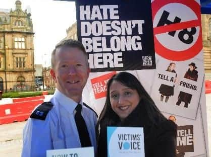 Hate crime officer PC Stuart Rutlidge and police link worker Farhet Quraishi, at the third annual Preston Standing Together Against Racism community day, held at Preston Flag Market.