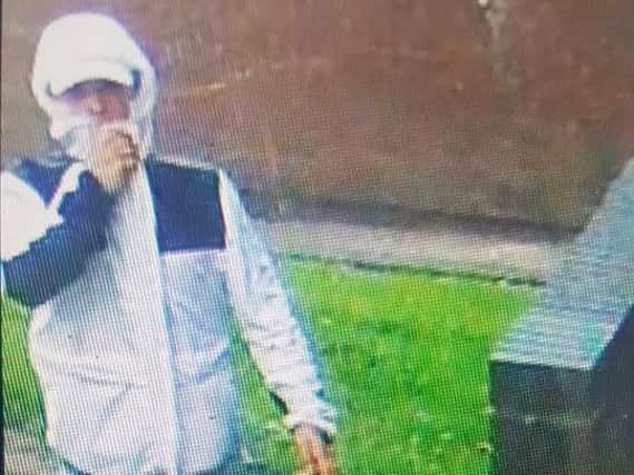 A CCTV image of a man has been released after reports of criminal damage atAlbany Academy in Chorley.
