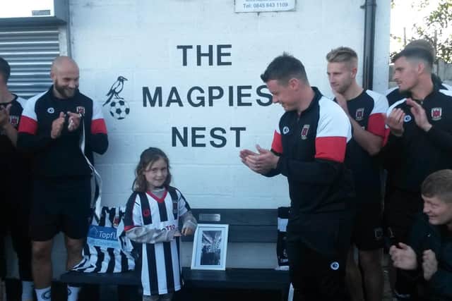 David Edwards' daughter Mahalia Edwards with Chorley players and their manager Jamie Vermiglio