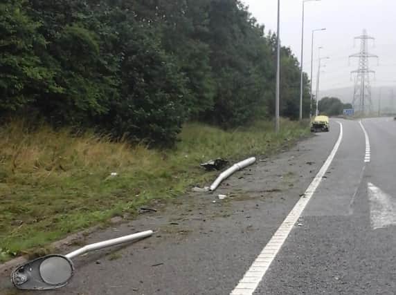 A lamppost has been knocked over in the crash. Photo: Highways England