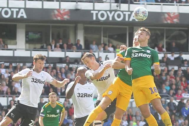 Ryan Ledson wins a header on his first Championship start in the defeat at Derby on Saturday