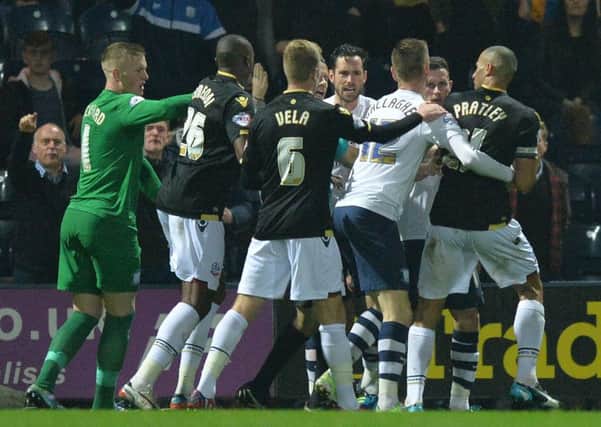 Preston and Bolton players clash during the 0-0 draw at Deepdale on Halloween night in 2015