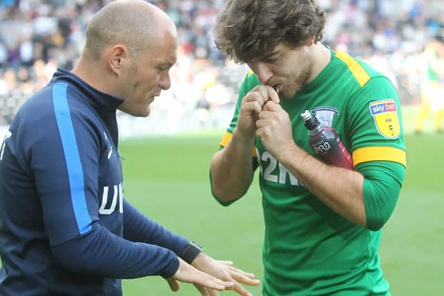 Alex Neil dishes out instructions to Ben Pearson at Derby