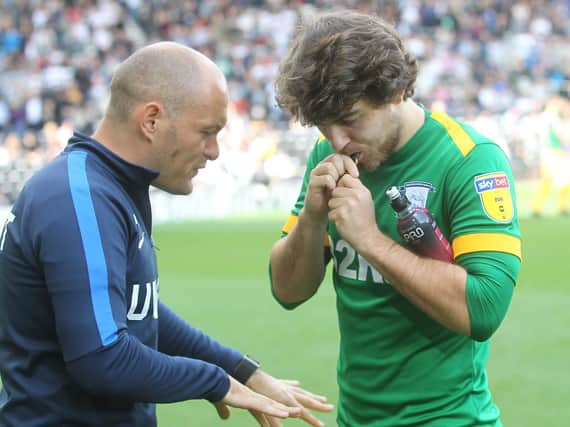 Alex Neil dishes out instructions to Ben Pearson at Derby