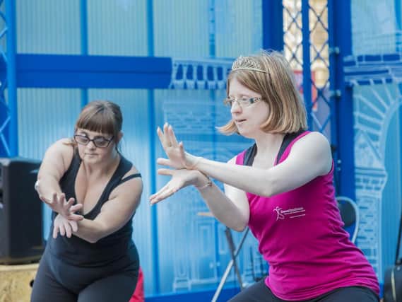 DanceSyndrome Founder and Director Jen Blackwell (right) with Dance Leader Pauline Hall (Left) on the Royal Mile stage at Edinburgh Festival