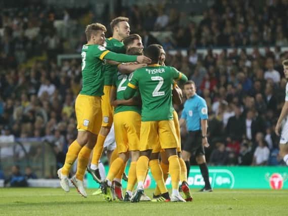 Preston's players celebrate Daniel Johnson's opening goal against Leeds