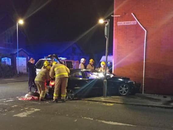 Emergency services were called when the car crashed into the wall of a house.