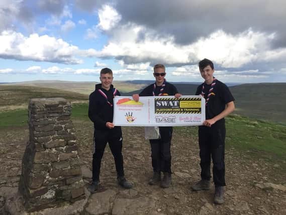 Marco Blackledge, Alex Paterson and Harrison Turner climbed the Yorkshire Three Peaks to raise funds fo rtheir trip to Uganda with West Lancs Scouts