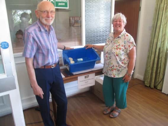 Laurence Ingham from St Paul's Church with Lynn Cottham, activities co-ordinator at Belmont Care Home