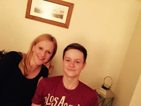 Adam Seaton, pictured with mum Karen, has been missing for four weeks