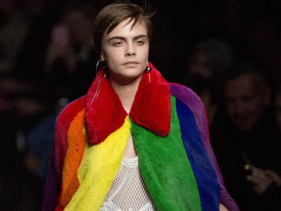 Cara Delevingne wears rainbow coloured faux fur coat to close Burberry's autumn/winter 2018 London Fashion Week show