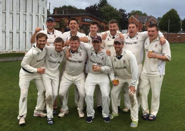 Longridge celebrate their Moore and Smalley Palace Shield Premier Division title success