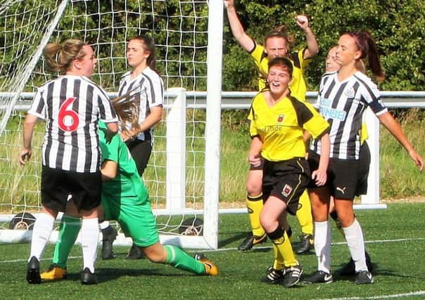 Chloe Wild celebrates her first goal for the club and the winner
