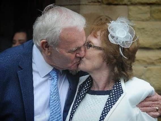 Ron and Ruth enjoy their first kiss as husband and wife
