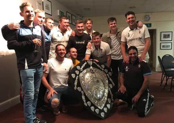 Longridge celebrate winning the Moore and Smalley Palace Shield