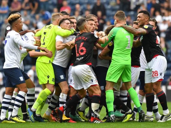 PNE and Bolton players clash after the final whistle at Deepdale