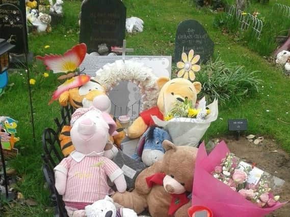 Teddy bears on baby Faiths grave in Preston Cemetary