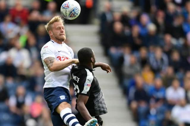 Tom Clarke played as one of three central defenders for PNE against Reading