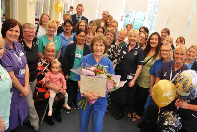 Janet Ashton celebrates her 80th birthday with a surprise party, organised by colleagues, family and friends, she has been a nurse since 1958 and still works at Royal Preston Hospital.