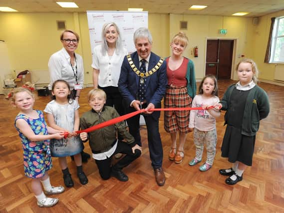Opening of Meladrama at St Margaret's Church Hall in Ingol. Preston mayor Trevor Hart cuts the ribbon with Melanie Ash, Hollie Thornton, actor Josie Cerise and some of the students