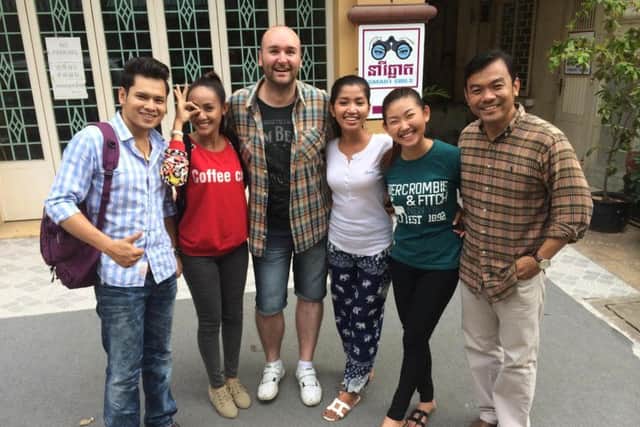 Stuart Cheetham in Cambodia with the cast of Smart Girls
